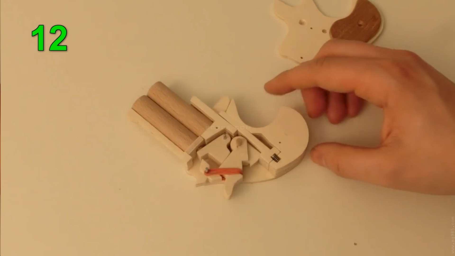 橡皮筋枪怎么安装/WGOG1005用木板制作一把可连发的橡皮筋玩具枪+图纸下载